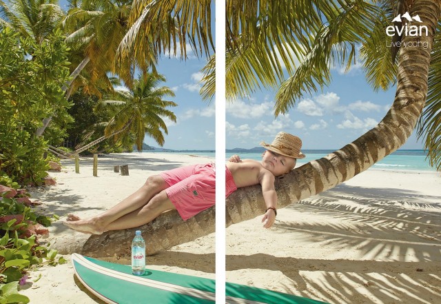 3.依云礦泉水一半身體年輕平面廣告創(chuàng)意設(shè)計(jì)-上海廣告設(shè)計(jì)公司廣告欣賞-棕櫚樹篇