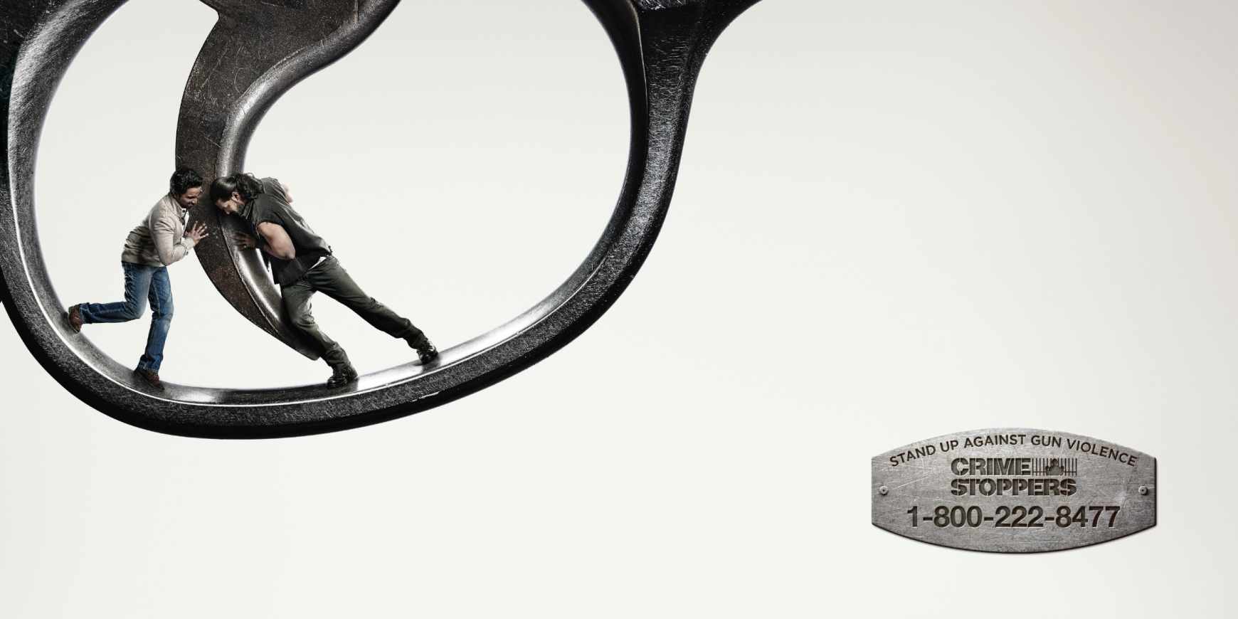 溫哥華報警熱線手槍篇公益平面廣告創(chuàng)意設(shè)計3