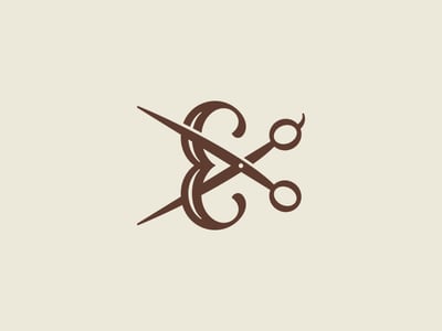 初始剪刀加“E”logo設(shè)計-上海logo設(shè)計公司