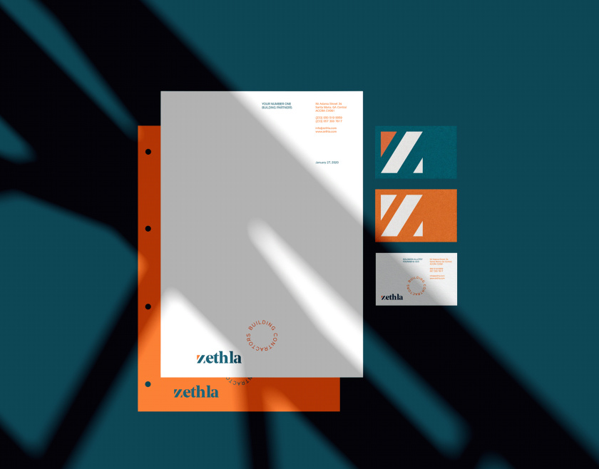 Zethla 建筑公司logo設(shè)計(jì)vi設(shè)計(jì)，正方形被斜切出字母Z+藍(lán)橙工業(yè)配色