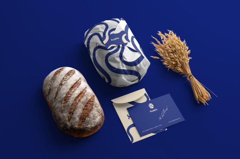 sania 烘培面包店品牌vi形象設(shè)計，寶藍色面包手繪線條輪廓圖案